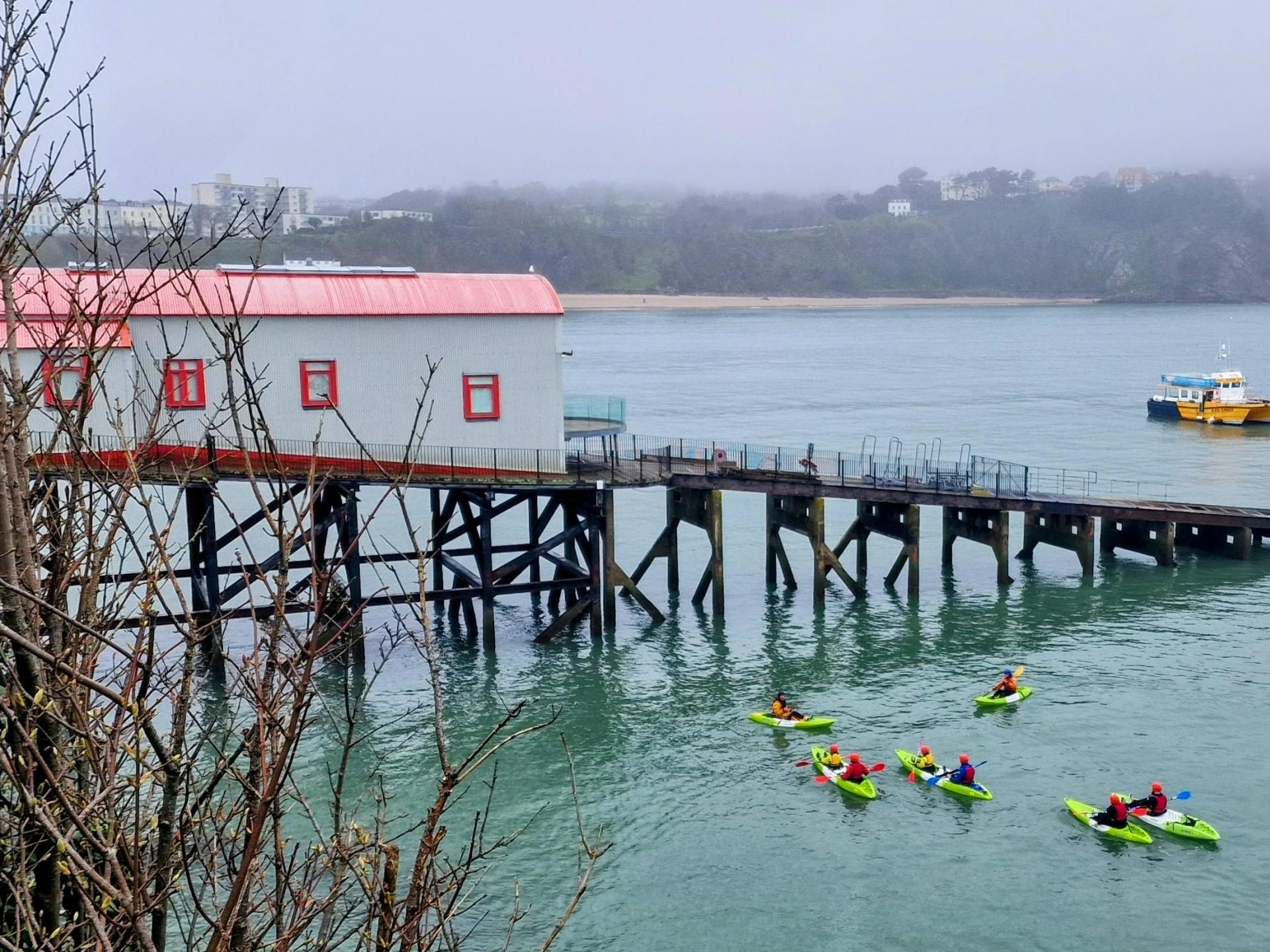 Misty kayak under the old lifeboat station.