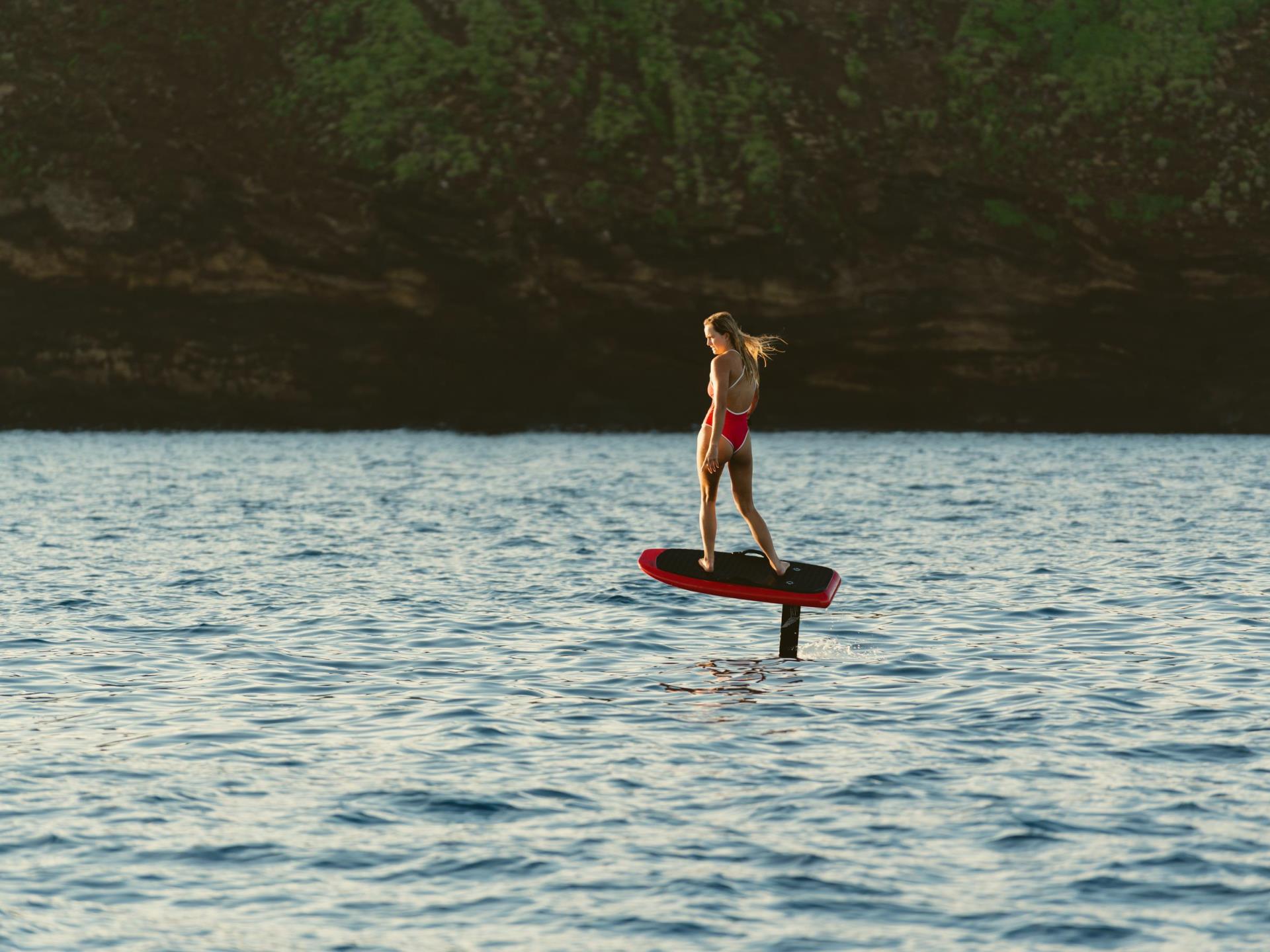 Girl riding efoil