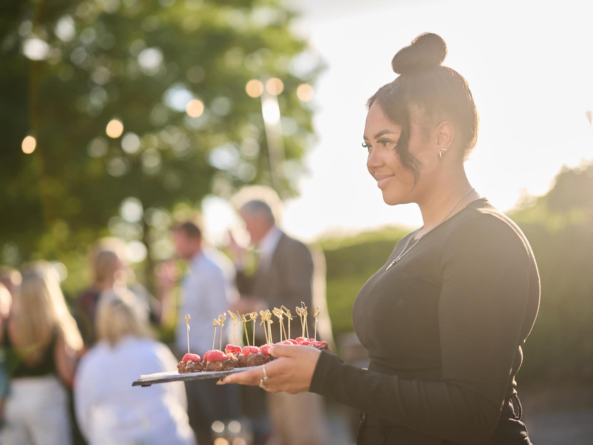 Canapes being served outside 