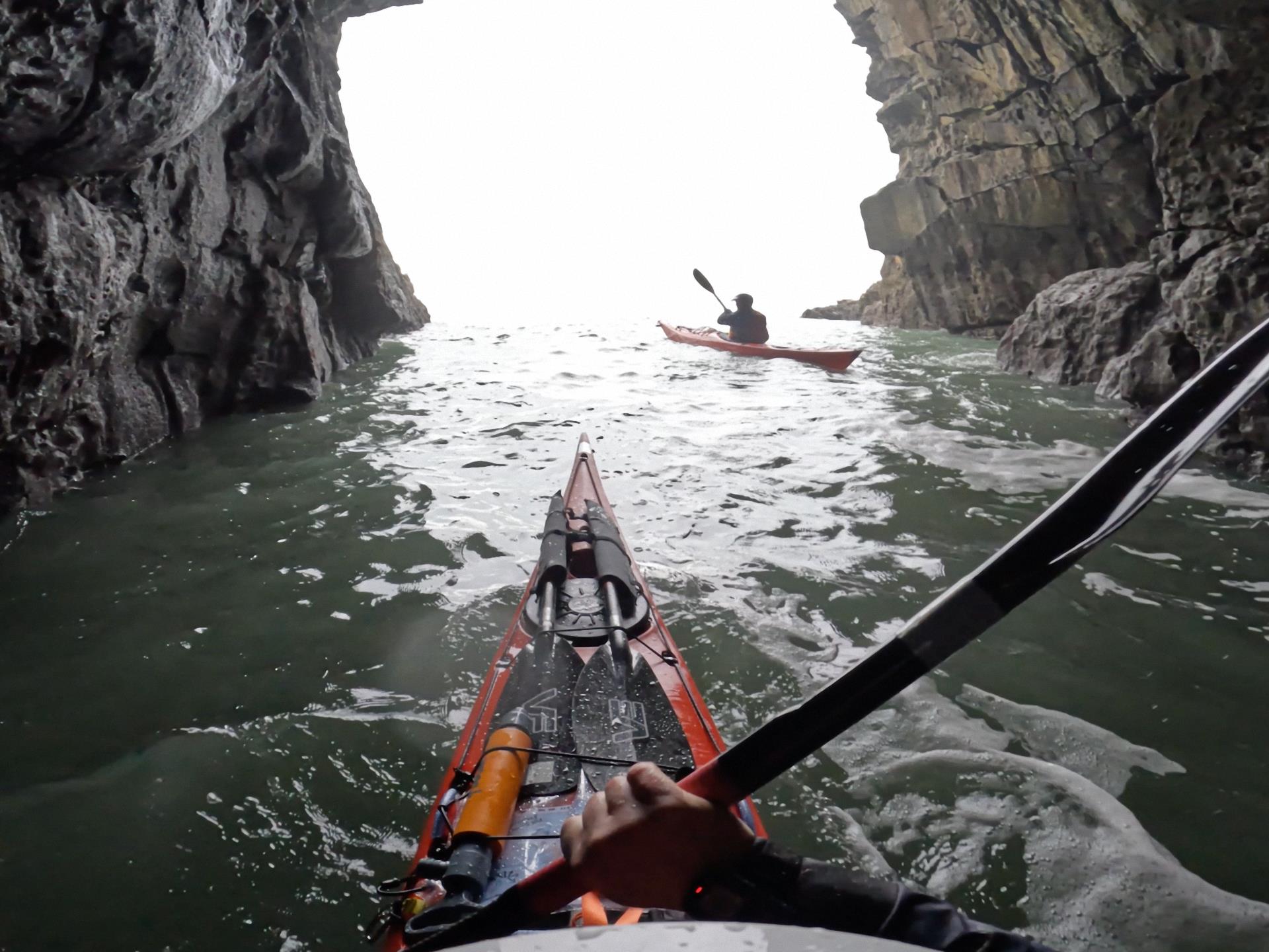 Sea kayaking in caves