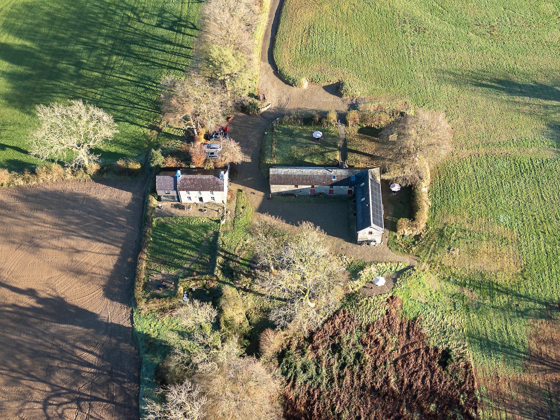 An aerial view of the farm during winter