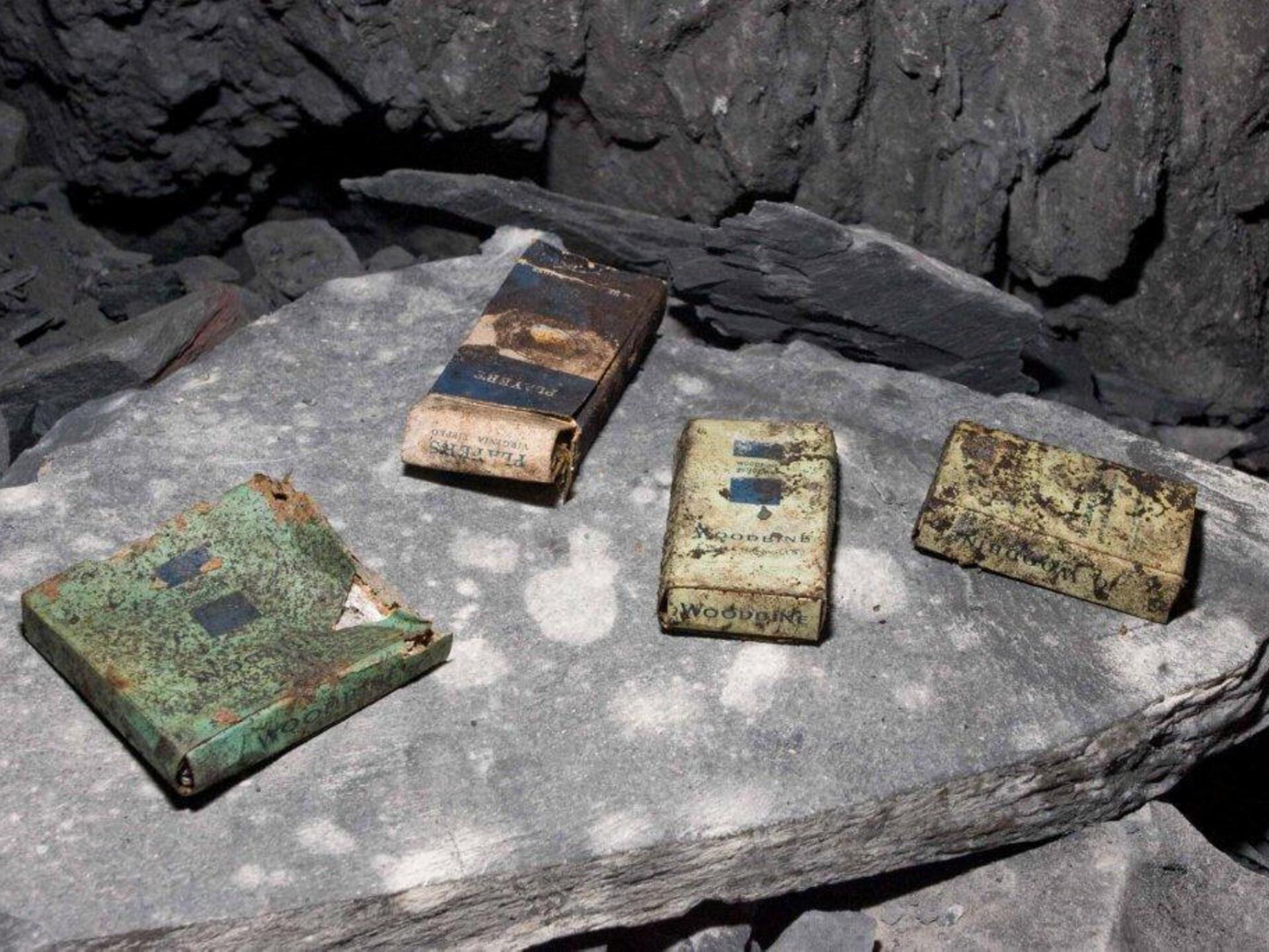 Discarded cigarette packets in Braich Goch Mine