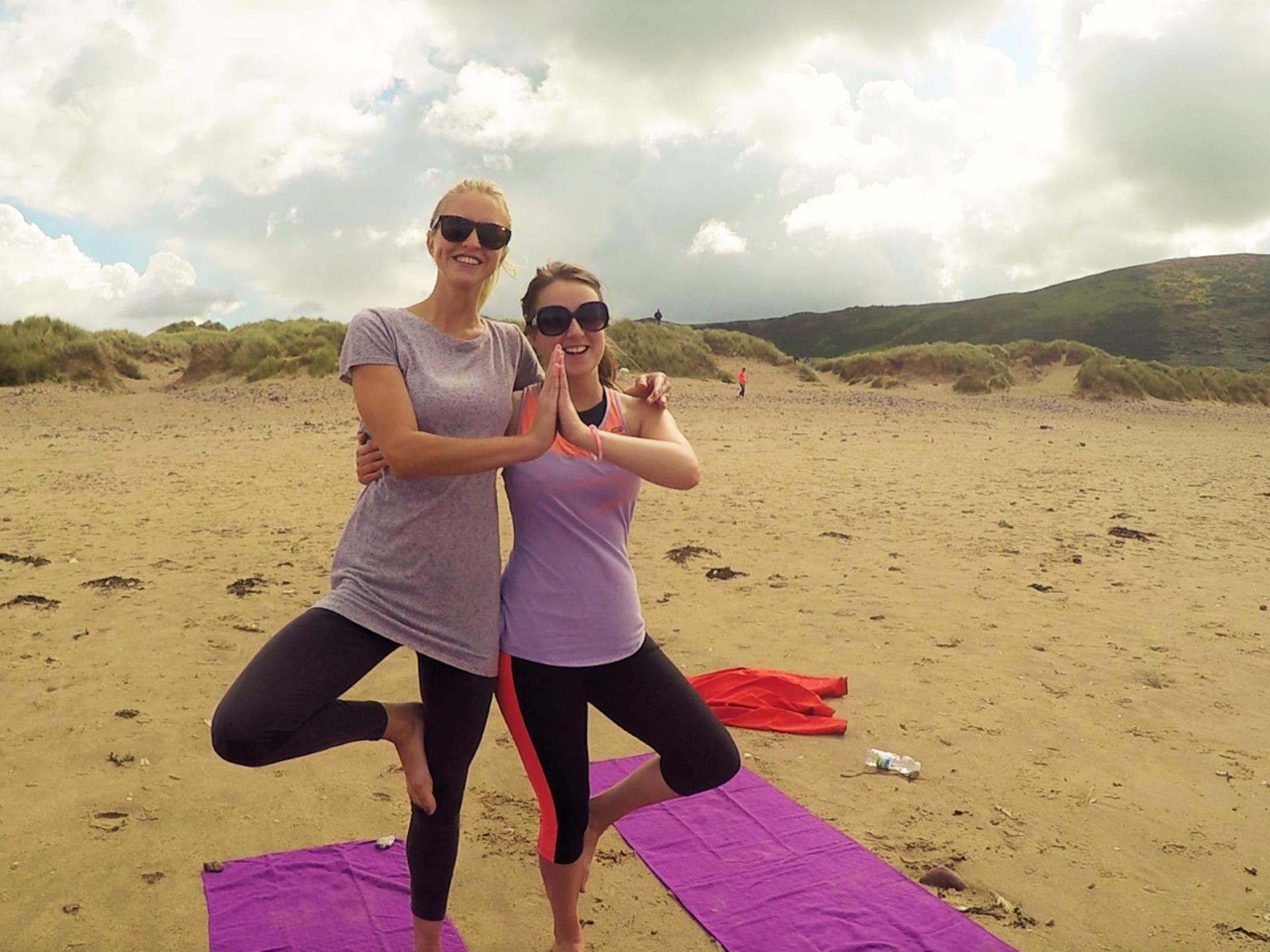 Beach yoga on a Corporate Retreat in Gower