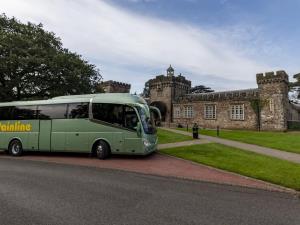 Mainline coach outside Hensol Castle Distillery