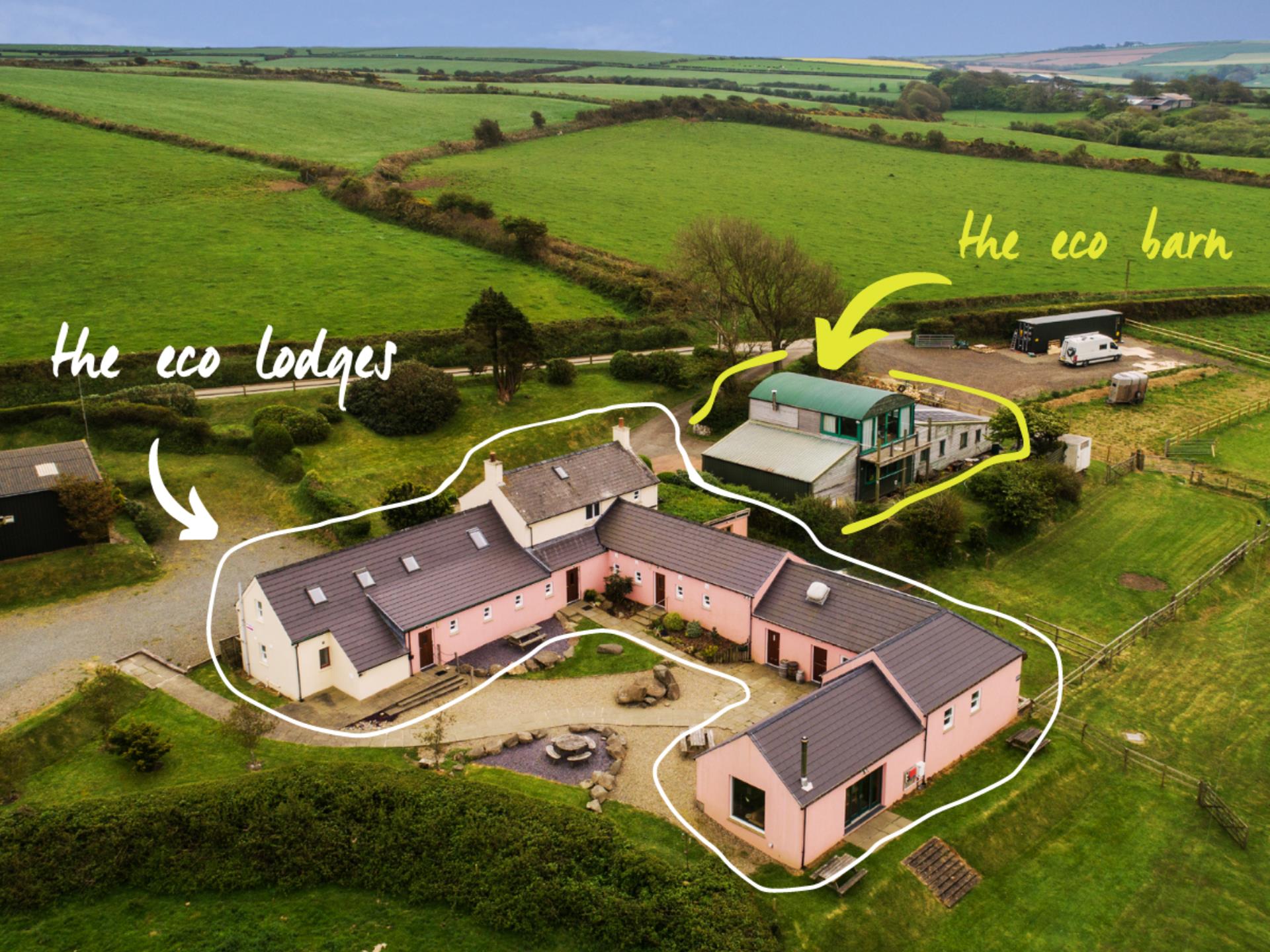 Aerial view of eco lodges and eco barn