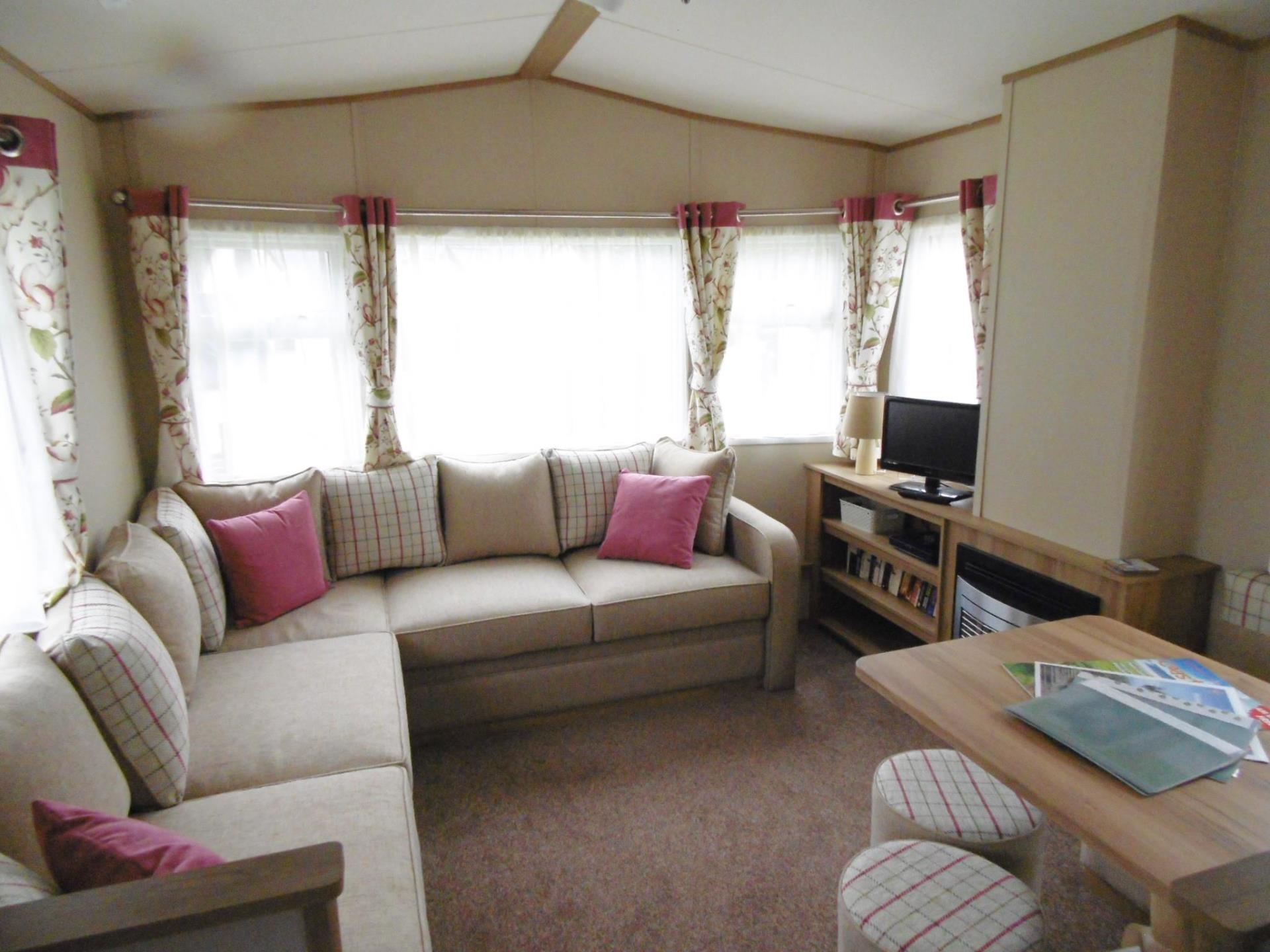 Larch caravan lounge and dining area