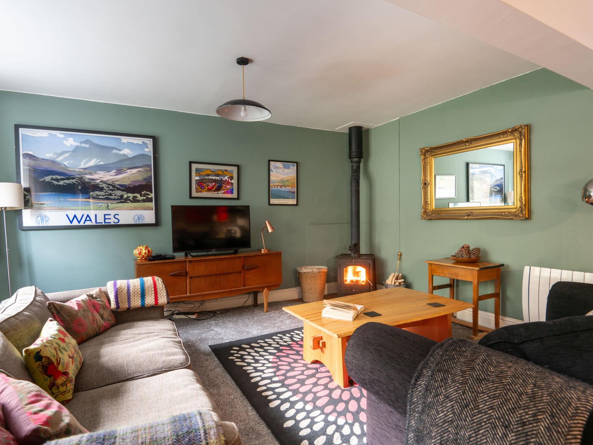 Comfy sofas and lounge with woodburning stove