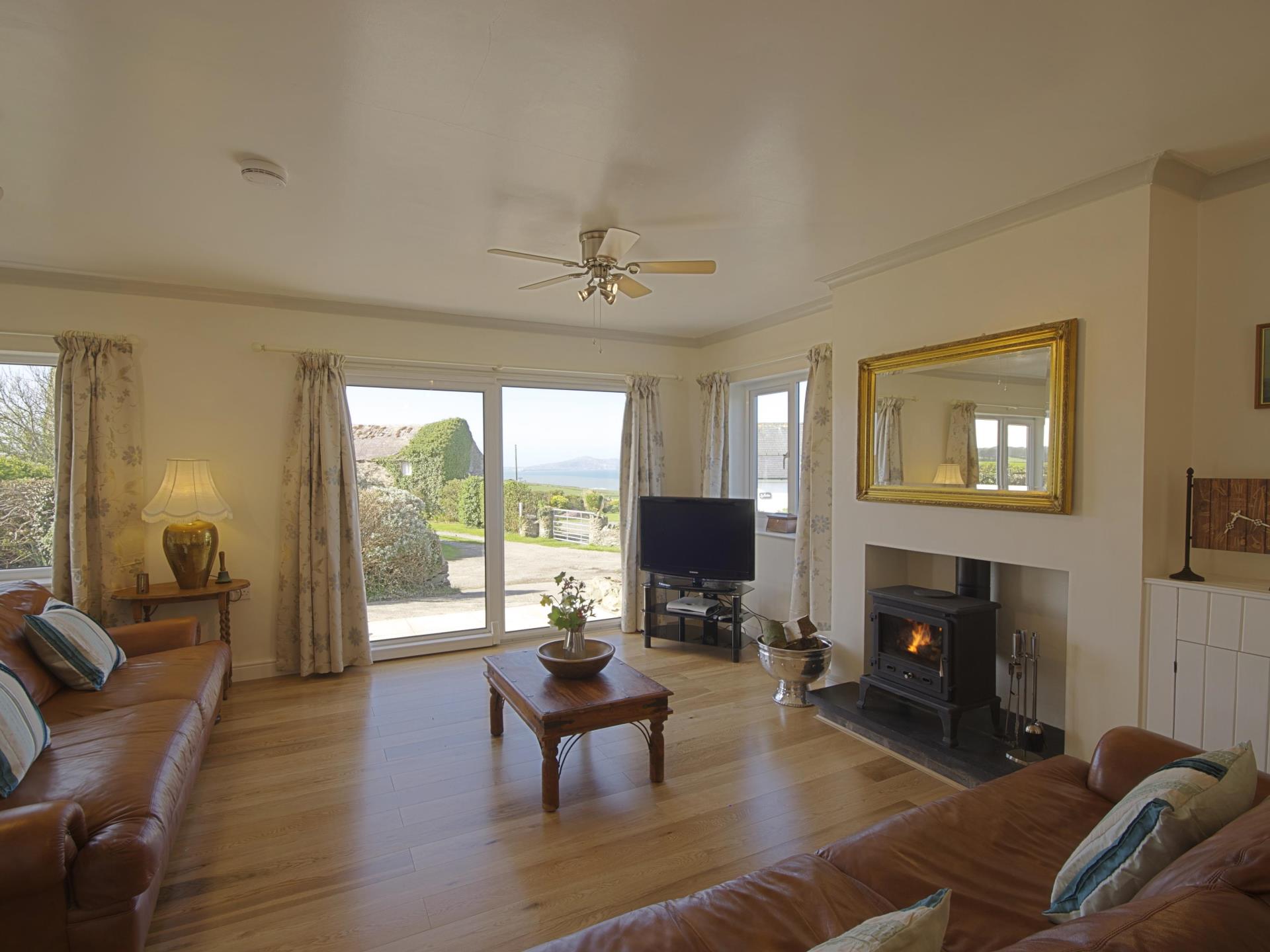 Cosy sitting room at Aotearoa with sea views
