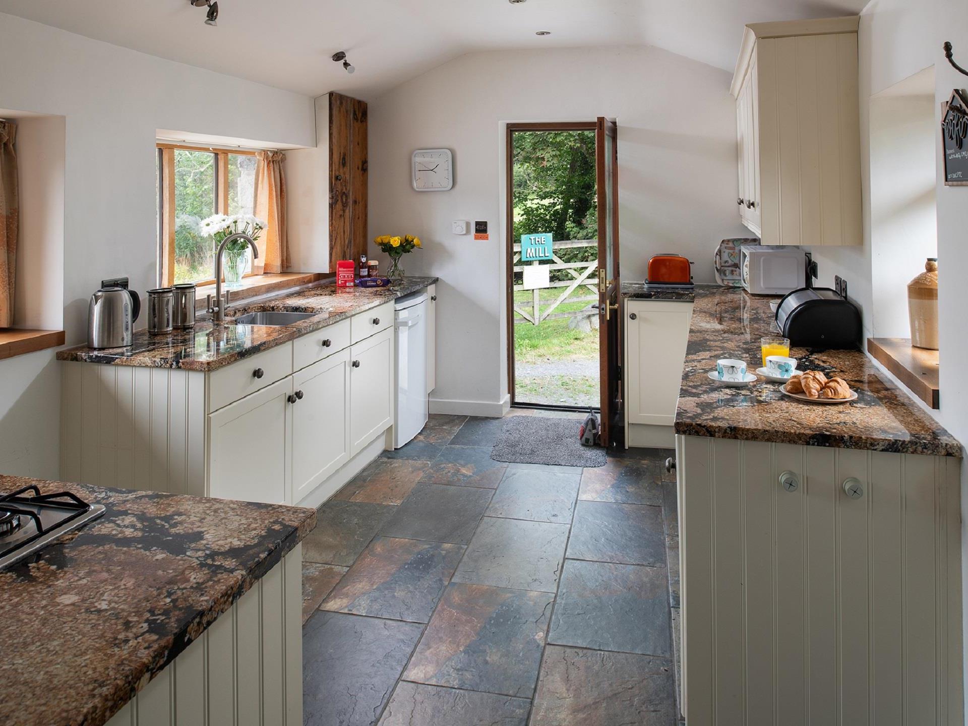 kitchen featuring granite worktops