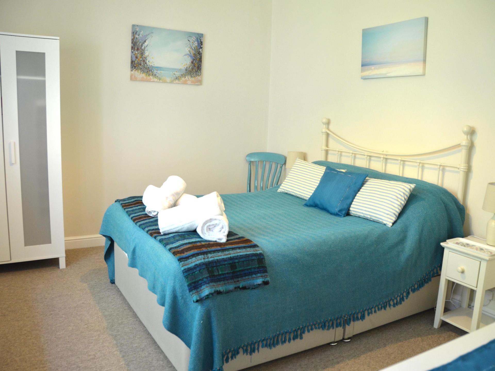 The blue bedroom at The Little Red House Mumbles