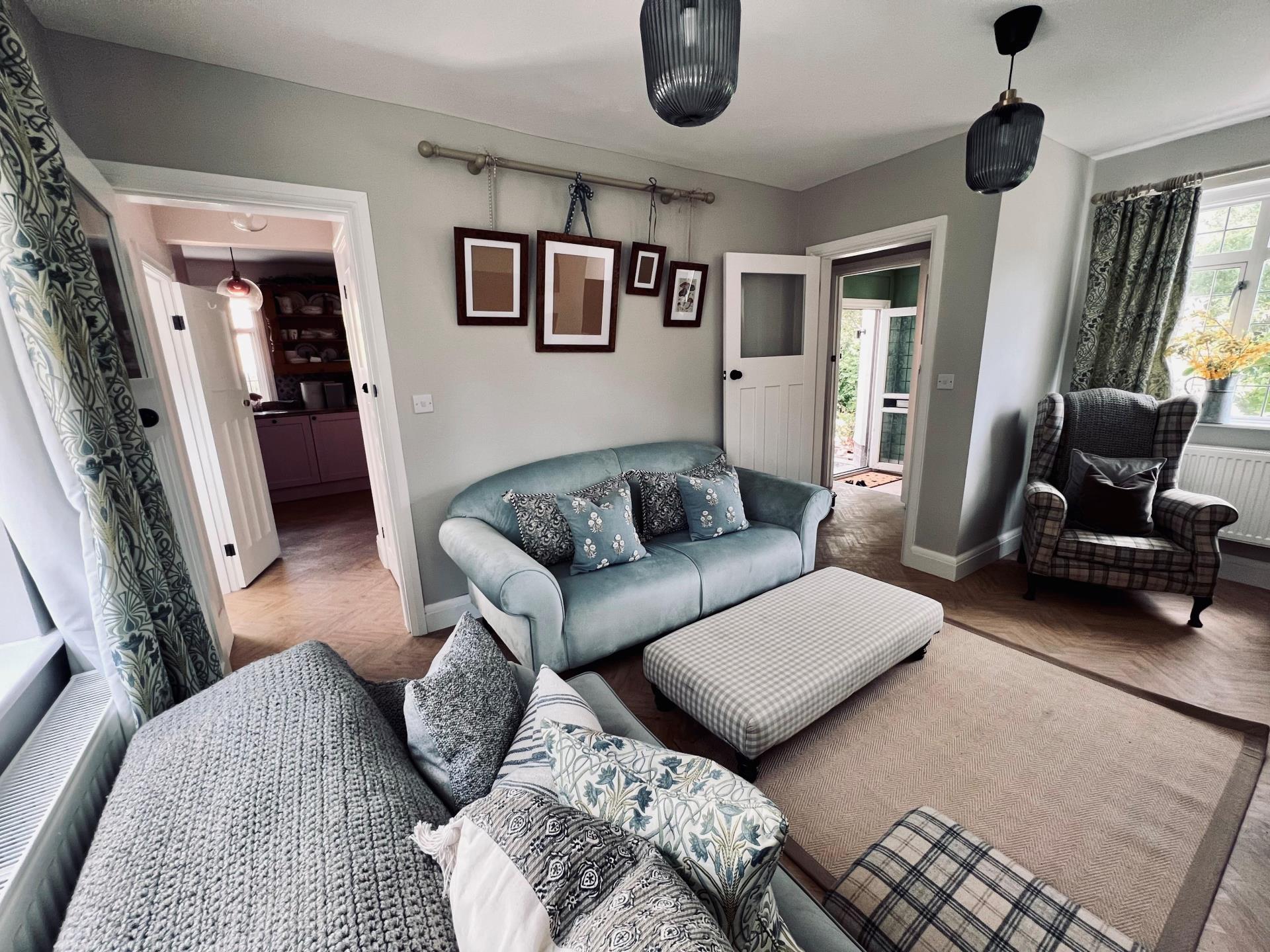 Living room to Kitchen and front entrance