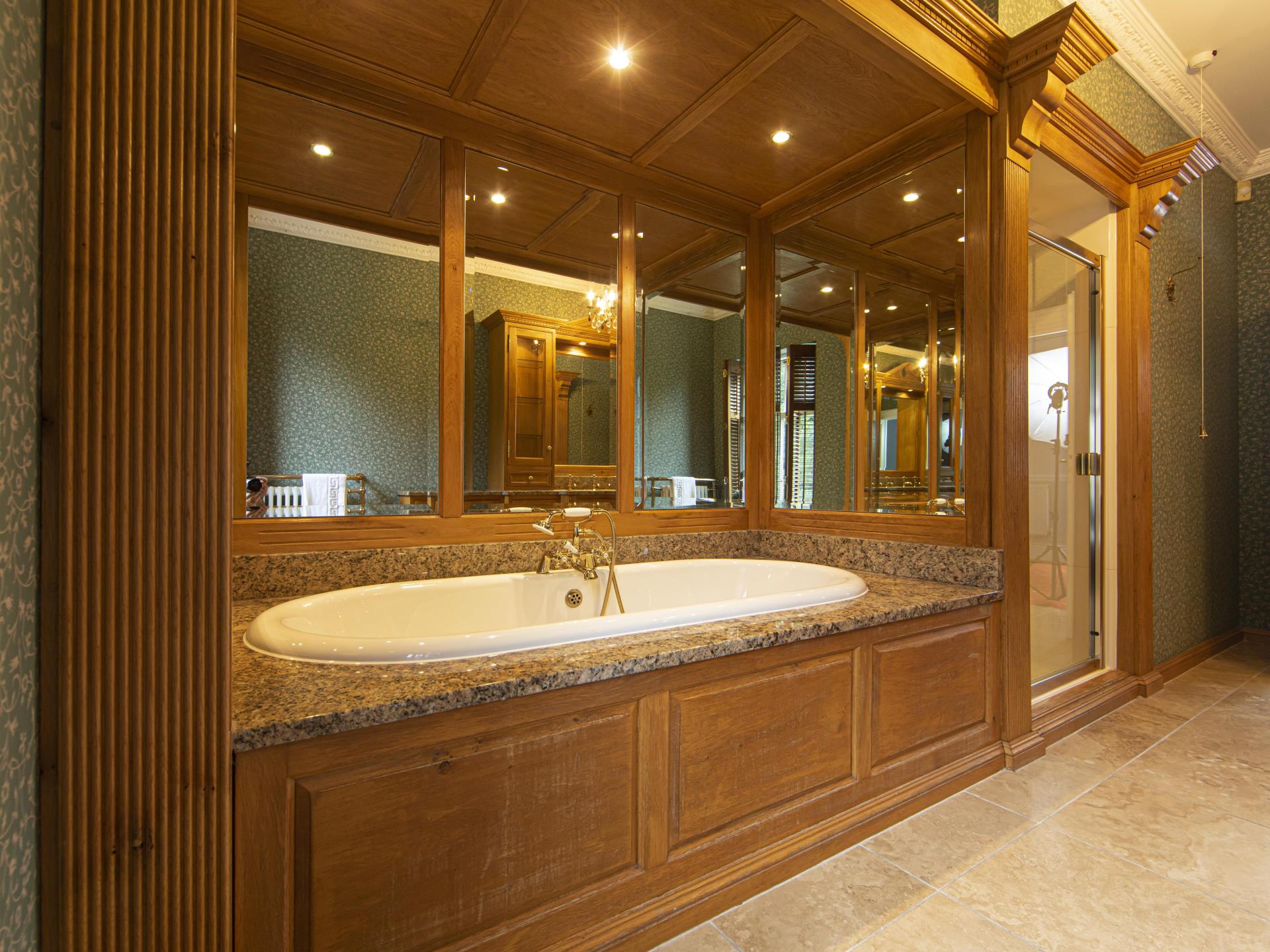 Luxurious Manor Bathroom with Marble and Wood