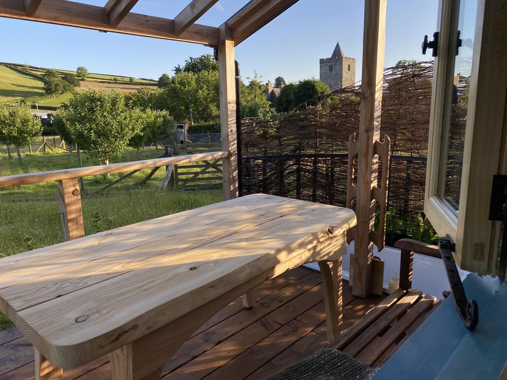 Covered deck with outdoor table 