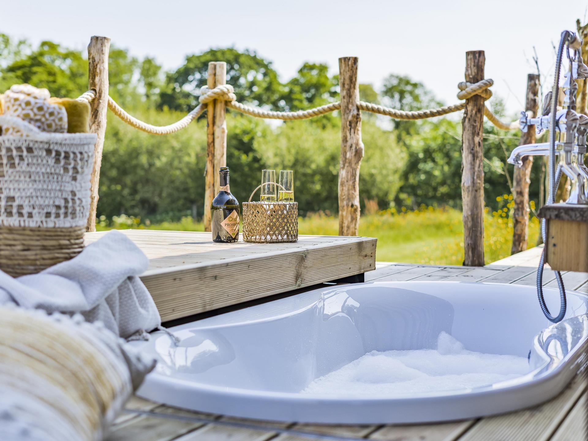 Relax in style in the Cabins outdoor sunken bath