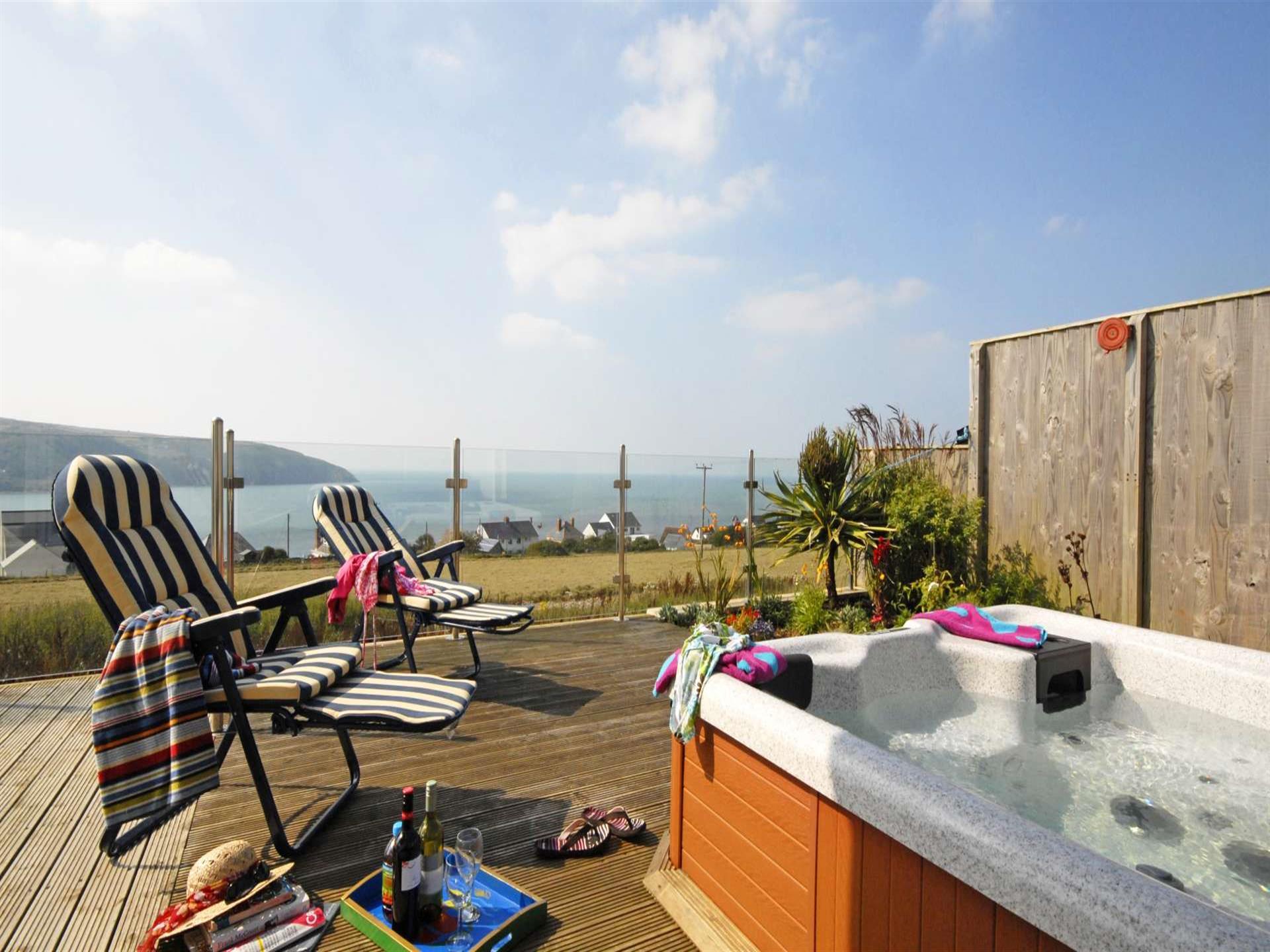 Holiday home by the sea with a hot tub