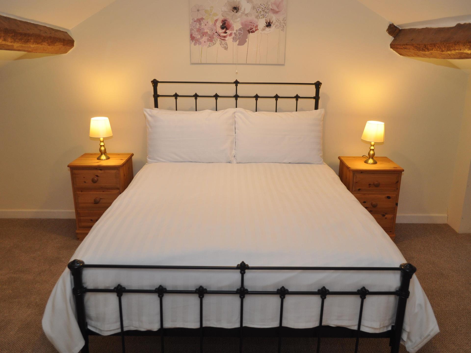 Double bed in Wye Cottage at Wye View