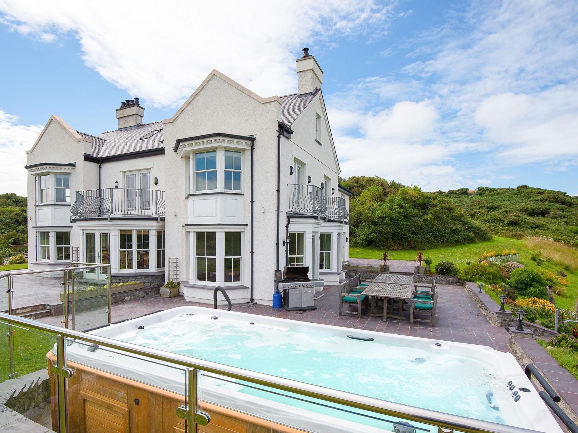 Llanlliana House, terrace and hot tub