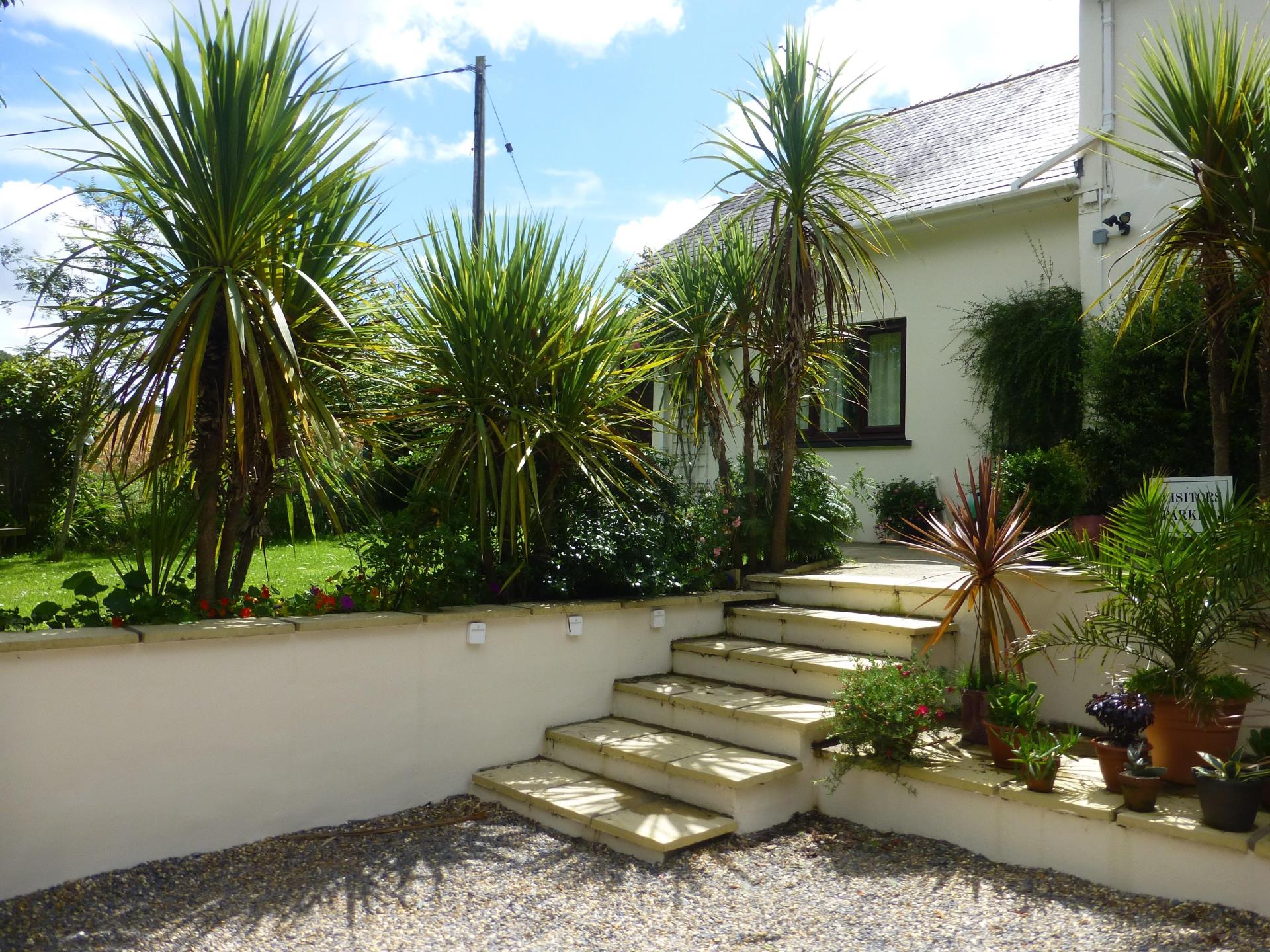 Parking and steps to cottage