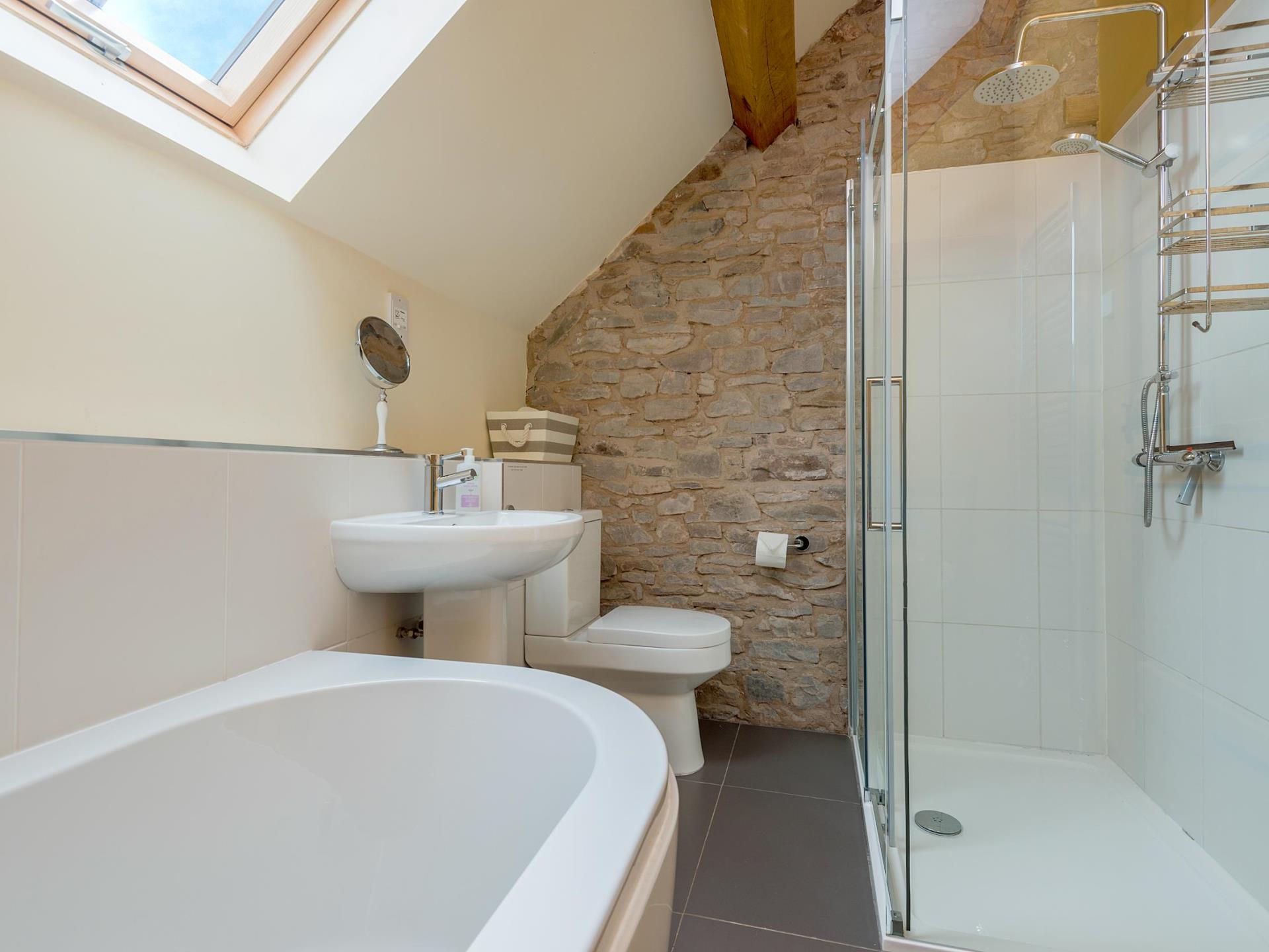 Main bathroom with large shower cubicle