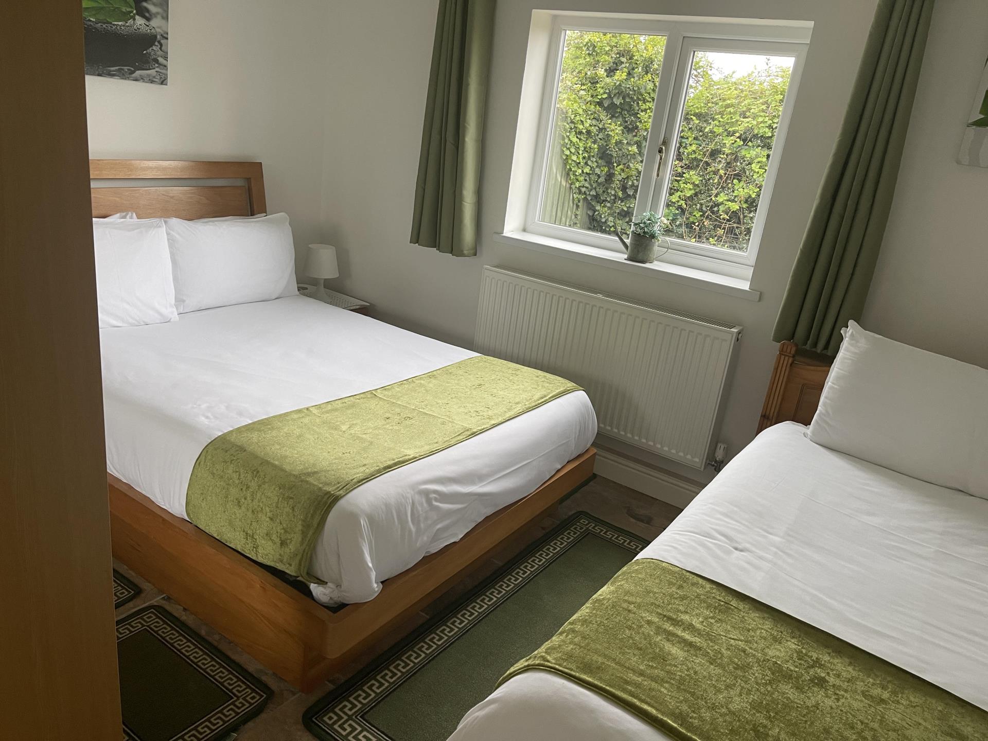 Twin room showing double and single beds