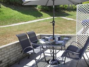 No. 6 - Patio set in Oxwich Leisure Park grounds.