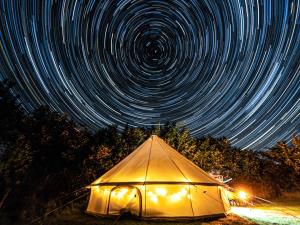 Bell tent glamping with starry skies