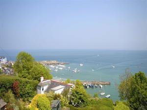Stunning coastal views over New Quay harbour and C