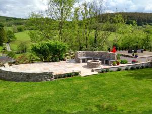 Stone and Slate Fire-pit, Terrace & Dai the Dragon